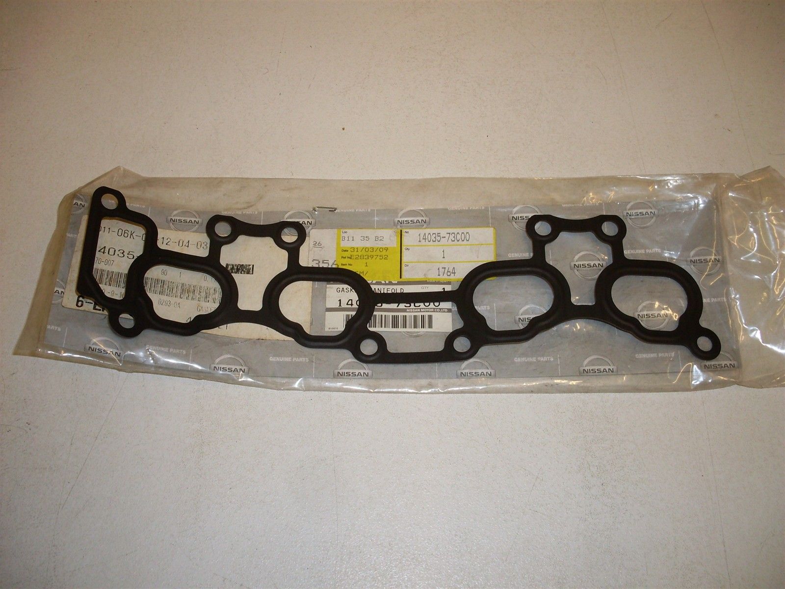 NISSAN 1403573C00 Прокладк