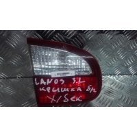 Фонарь крышки багажника левый T100 1998