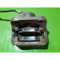 Суппорт тормозной Renault Megane слева спереди 7701207958