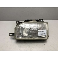 Фара левая Mazda 121 1 1989 110-61238L