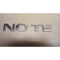 Эмблема на крышку багажника Nissan Note (E11) (2006 - 2013) 908929U000
