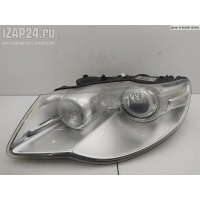 Фара левая Volkswagen Touareg 2008 7L6941039C