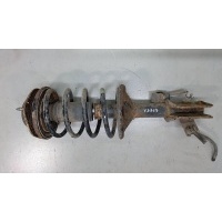 Амортизатор подвески перед. левая Mitsubishi Carisma 1997 MR369005