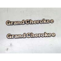 гранд cherokee zj 92 - 98r..emblematy на дверь передняя
