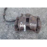 скоба суппорта переднего правого Mitsubishi Colt 5 1998