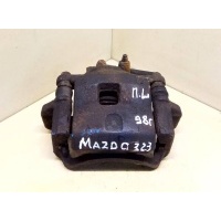 скоба суппорта переднего левого Mazda 323 BA 1998