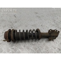 Амортизатор подвески передний левый Mazda Demio 2002 DC37-34-900