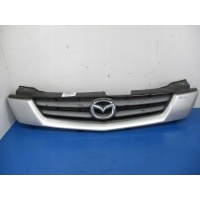 Mazda demio решетка радиатора эмблема серебренная