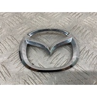 эмблема ( шылдик ) Mazda Demio 2 DY3W 2002 (2002-2007) D35151730, <strong>-Б/У Детали сняты с АВТОМОБИЛЯ</strong>