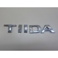Эмблема на крышку багажника Nissan Tiida (C11) (2007 - 2014) 90892EM40A