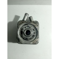 Теплообменник масляного фильтра Volkswagen Golf 4 2002 028117021K