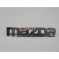 Эмблема на крышку багажника Mazda Mazda 3 (BL) (2009 - 2013) BBY951710