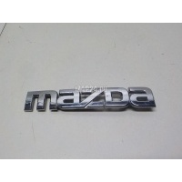 Эмблема на крышку багажника Mazda Mazda 2 (DE) (2007 - 2014) D65251710