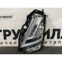 фара левая Volvo FH5 84233646,23752680