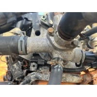 Фланец (тройник) системы охлаждения Volkswagen Golf 4 2000 038121133A