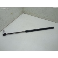 Амортизатор крышки (двери) багажника Лев. Mazda 2 2008 D65163620