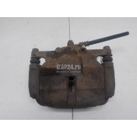 Суппорт тормозной передний левый Nissan Qashqai+2 (JJ10) (2008 - 2014) 41011JD00A