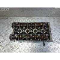 Головка блока цилиндров двигателя (ГБЦ) Opel Astra H (2004-2009) 2005