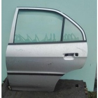 уплотнитель двери задней левой Mitsubishi Lancer 6 2000