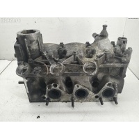 Головка блока цилиндров двигателя (ГБЦ) Volkswagen Fox 2006 03D103374F