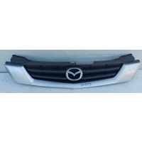 Mazda demio решетка радиатора