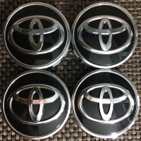 Крышки toyota oe 62 мм avensis camry rav4 c - hr hybrid yaris 4szt
