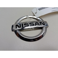 Эмблема на крышку багажника Nissan Tiida (C11) (2007 - 2014) 90890EM30A