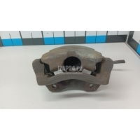Суппорт тормозной передний левый Nissan Primera P11E (1996 - 2002) 410112F522