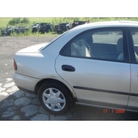 Mazda 323 s ба 4d седан 94 - 98 стекло правый задняя