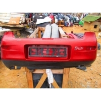 Бампер задний Mazda 323F 1997