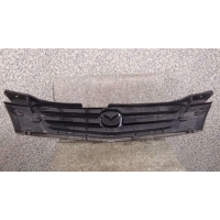 Решетка радиатора СИНЯЯ , ДЕФЕКТ НИЖНЕГО КРЕПЛЕНИЯ. Mazda Demio DW 2001 DC3550712