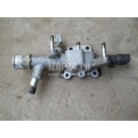 Фланец двигателя системы охлаждения Mazda 626 (GF) (1997 - 2002) FSM11517ZE
