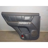 Обшивка двери задней левой Hyundai-Kia Sorento (2002 - 2009) 833013E070W2