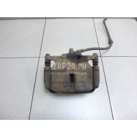 Суппорт тормозной передний левый Nissan Qashqai (J10) (2006 - 2014) 41011JD00A