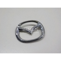 Эмблема на крышку багажника Mazda 323 (BJ) (1998 - 2003) B25D51730B