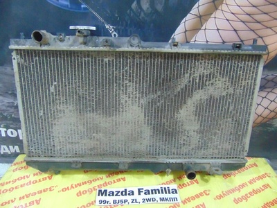 ZL0115200A Радиатор охлаждения двигателя Mazda Familia BJ5P 1999