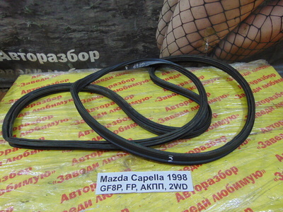 GE5A56951E Уплотнитель багажника Mazda Capella GF8P 1998