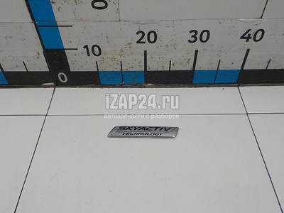 KD5351771 Эмблема на крышку багажника Mazda CX 5 (2012 - 2017)