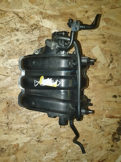 03E129711C коллектор впускной SKODA Fabia 2008