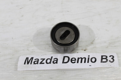 B63012700E Ролик натяжной Mazda Demio DW3W 2000