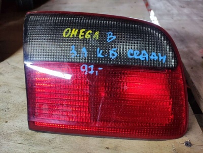 Фонарь крышки багажника левый Opel Omega B 1996