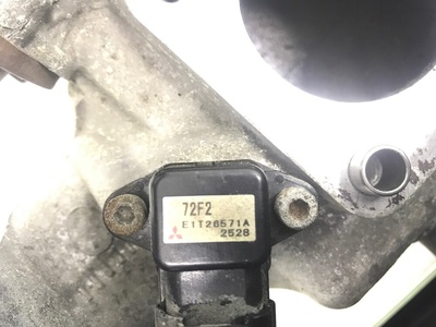E1T26571A Коллектор впускной Suzuki Ignis 2002