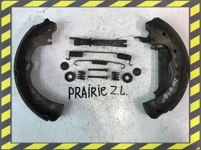 Механизм развода задних тормозных колодок левый Nissan Prairie 1998