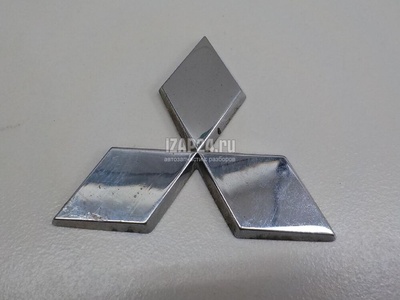 MN126477 Эмблема Mitsubishi Lancer (CS/Classic) (2003 - 2008)