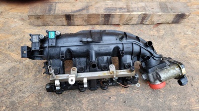 55573168 коллектор впускной opel astra j 1.4 т a14net