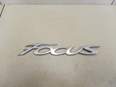 1714989 Эмблема на крышку багажника FORD Focus III 2011>