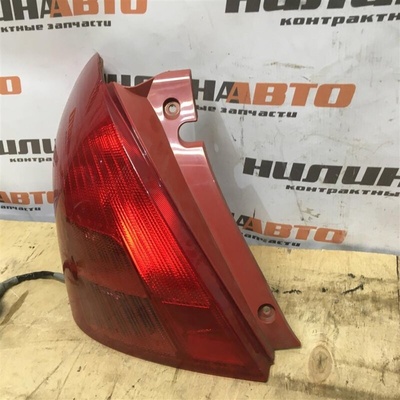 3567062J00 Фонарь левый SUZUKI Swift 3 2007