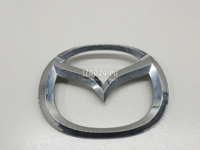 C23551731A Эмблема Mazda Mazda 2 (DE) (2007 - 2014)