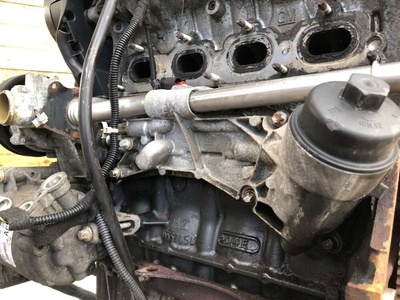 12992593 Корпус масляного фильтра Opel Astra H 2004 ,0561101049