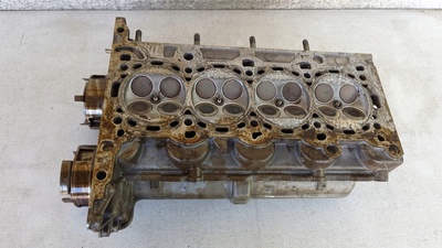 55565291 головка блока цилиндров распредвалы opel astra j 1.4t a14net повреждена